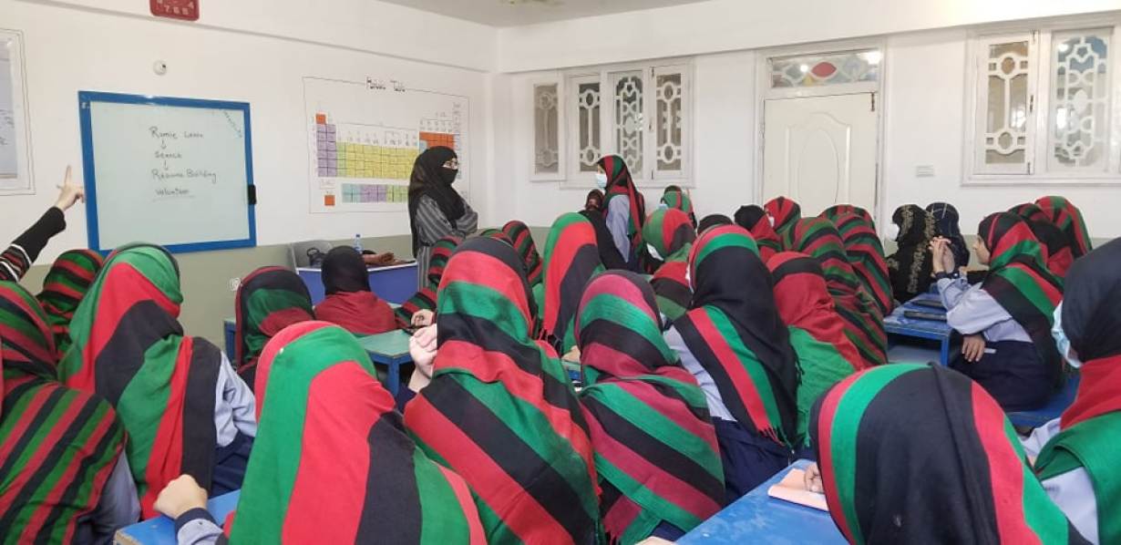 Girls attend class at an undisclosed location in Afghanistan.