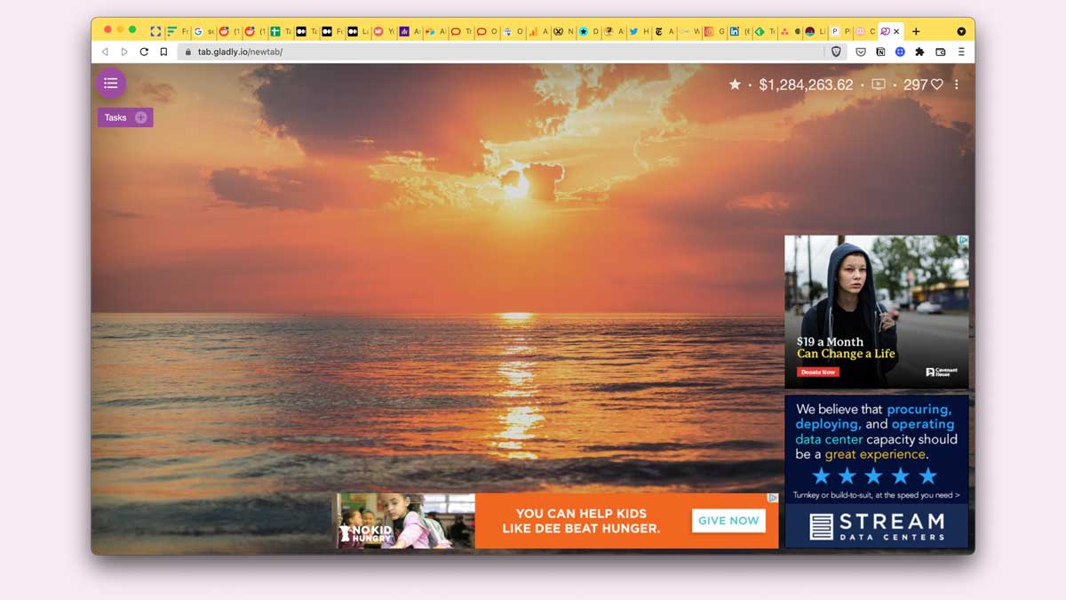 Screenshot of Tab for a Cause with a sunset background picture behind the ads