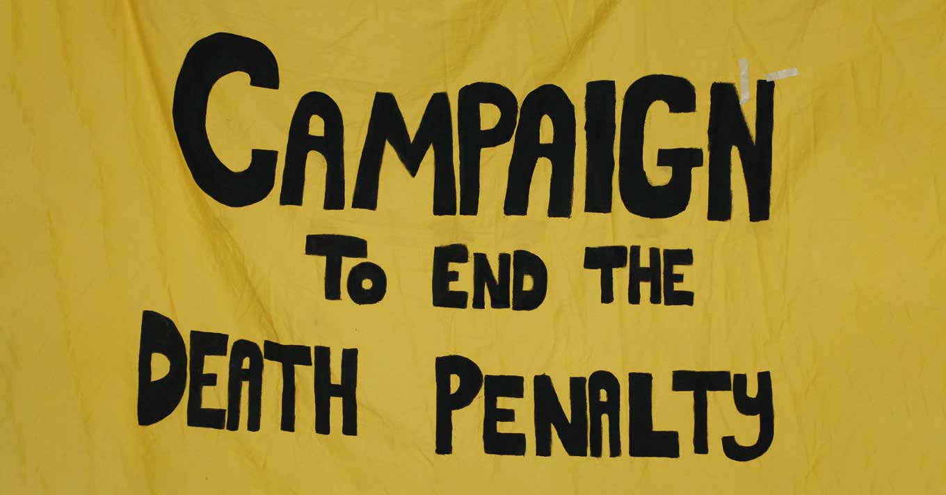 Campaign To End The Death Penalty — On a Yellow Banner