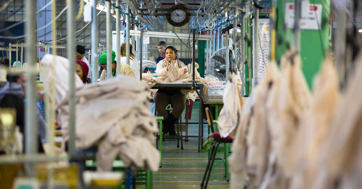 A woman works in a garment factory