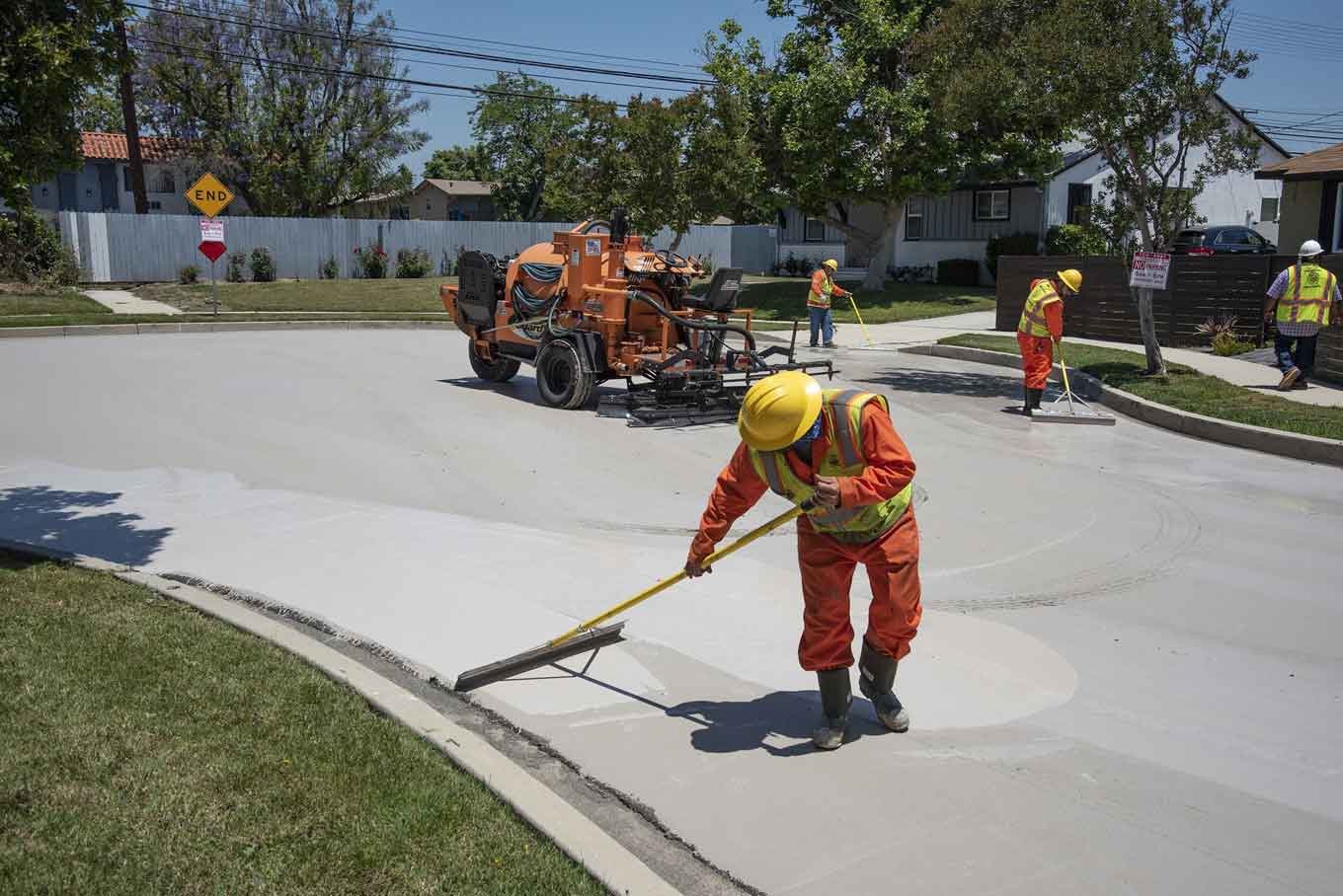 California workers painting streets white to reflect heat
