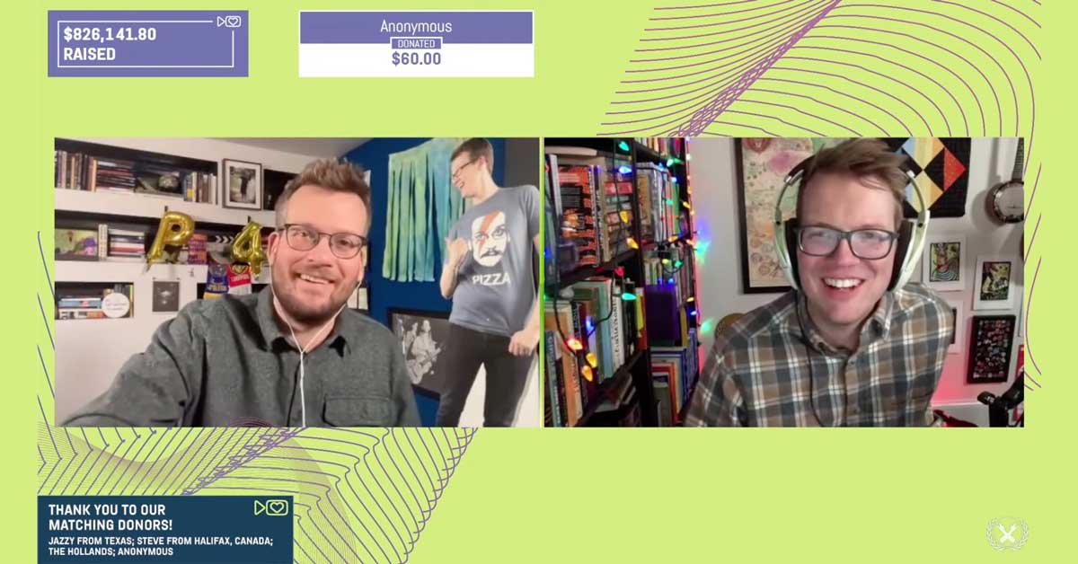 John Green and Hank Green smiling together on the 2022 Project for Awesome livestream