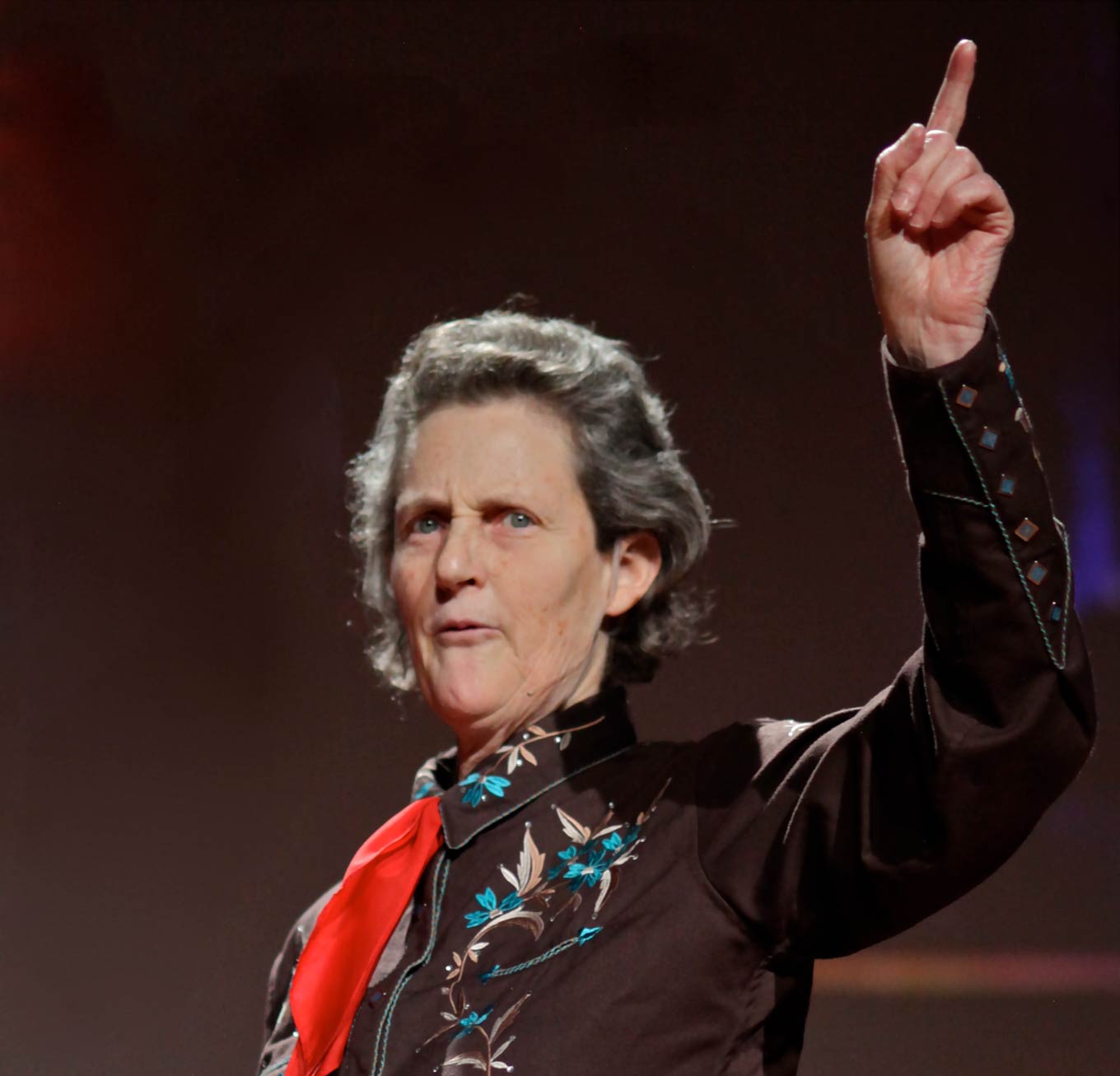 Temple Grandin speaking on stage at TED conference