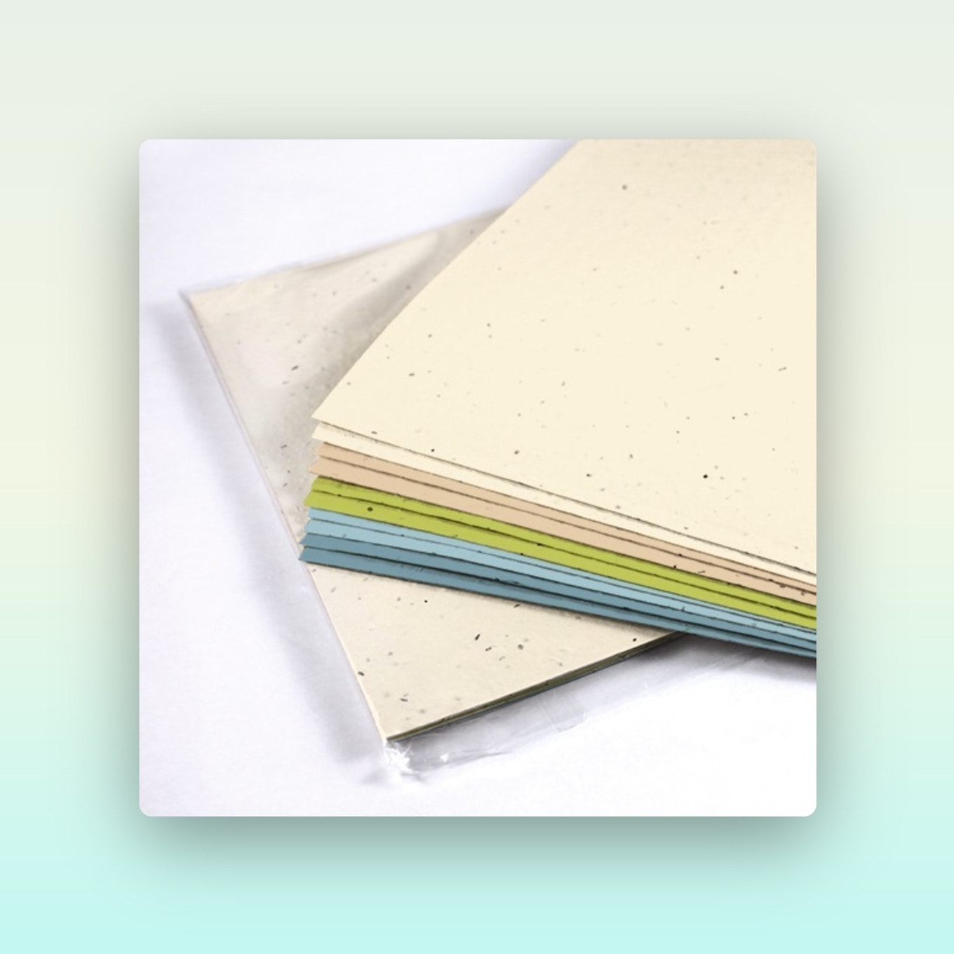 A stack of colorful seed paper from Botanical Paper