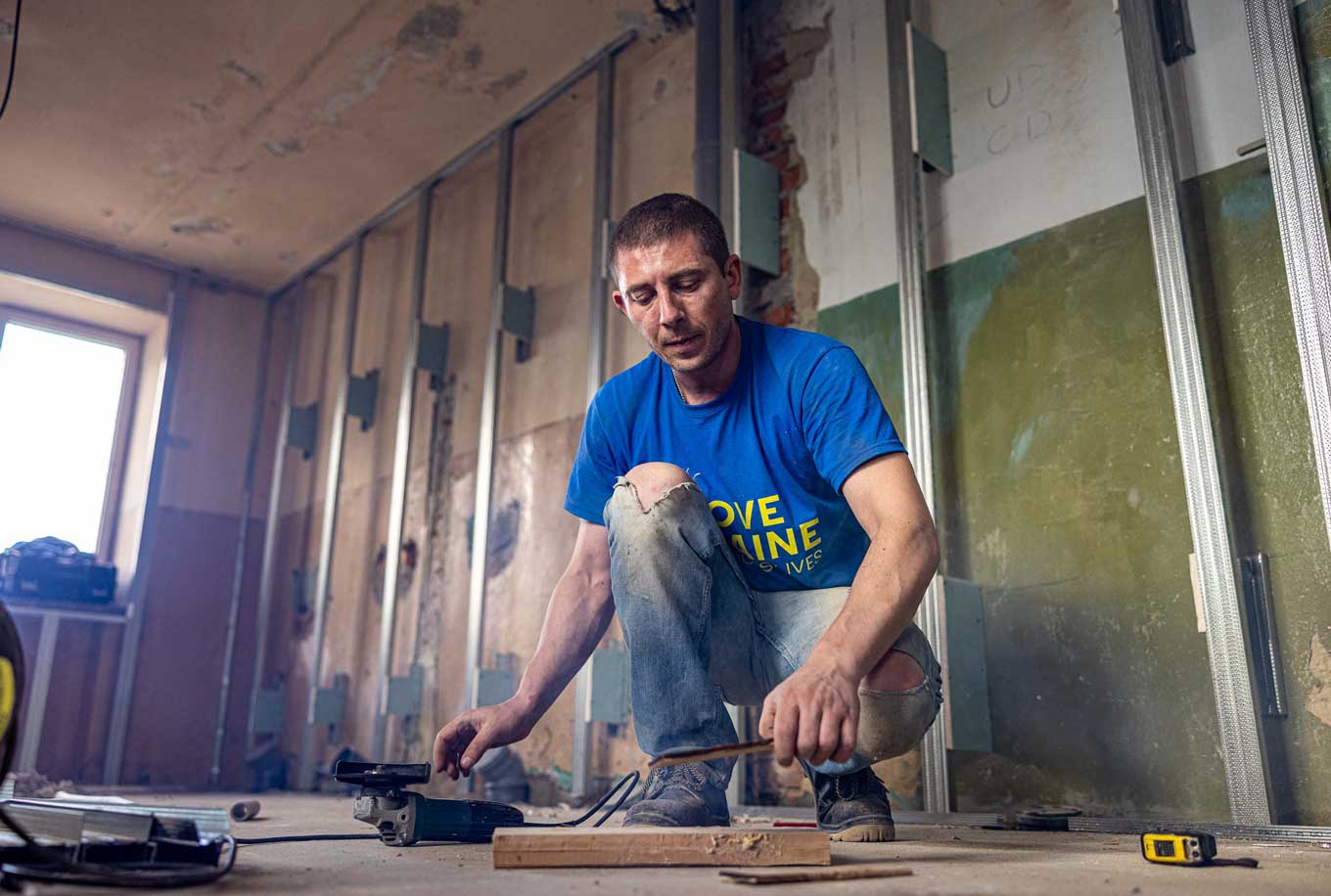 A volunteer working in a new building