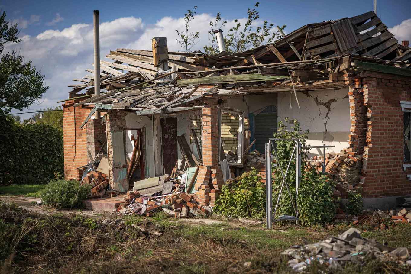 A destroyed single family brick home in Ukraine