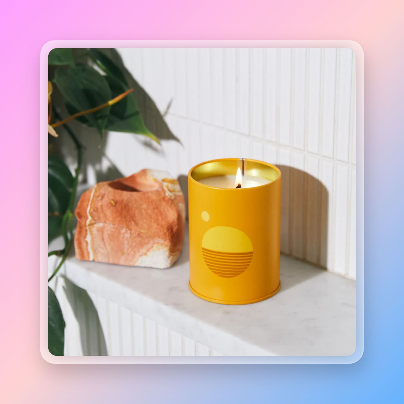 A cute orange candle in a tin