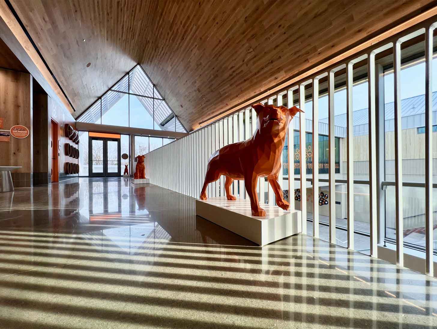 Lobby of the Best Friends Pet Resource Center, showing large sculptures of a dog