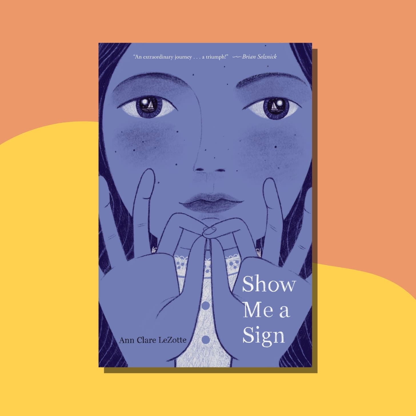“Show Me a Sign” by Ann Clare LeZotte - Cover has a closeup view of a woman's face, with sailboats reflected in her eyes, and her hands doing sign language