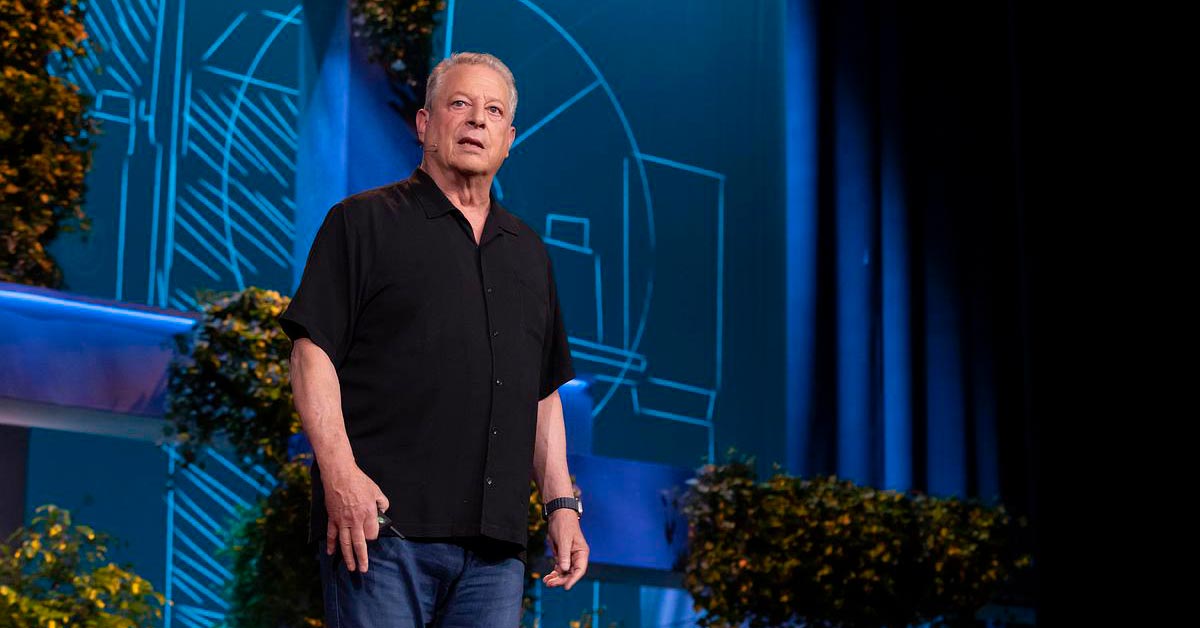 Al Gore stands on stage