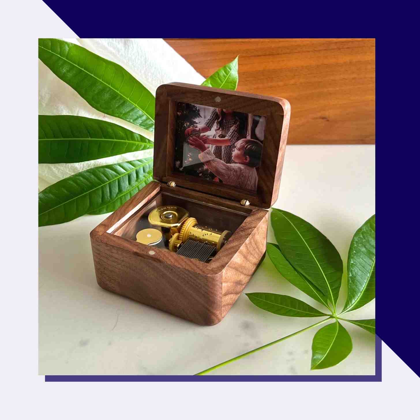 A Wooden Custom Music Box With A Family Picture Inside