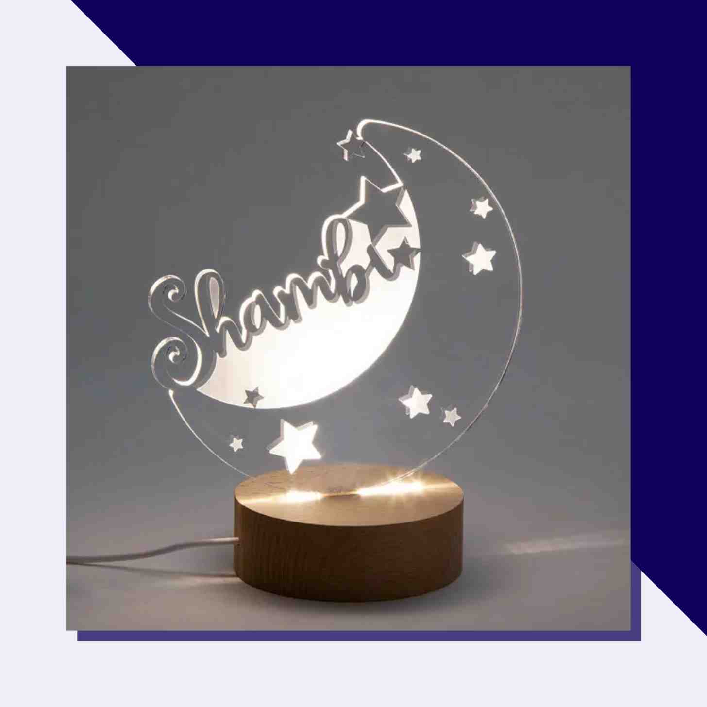 A Personalized Night Light With A Moon Shape Engraved With A Name