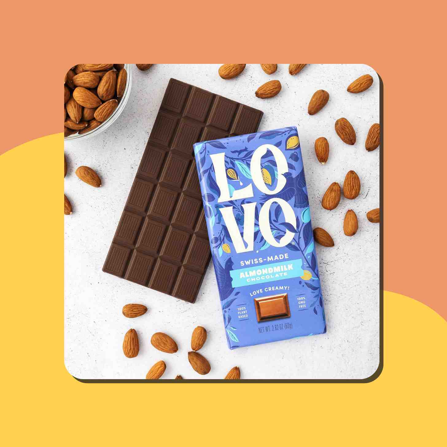 A Lovo Chocolate Bar And Its Envelope Sorrounded By Almonds