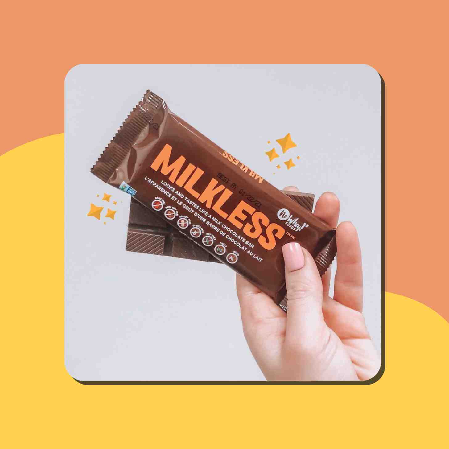 A Person Holding A No Whey! Milkless Chocolate Bar And Its Envelope