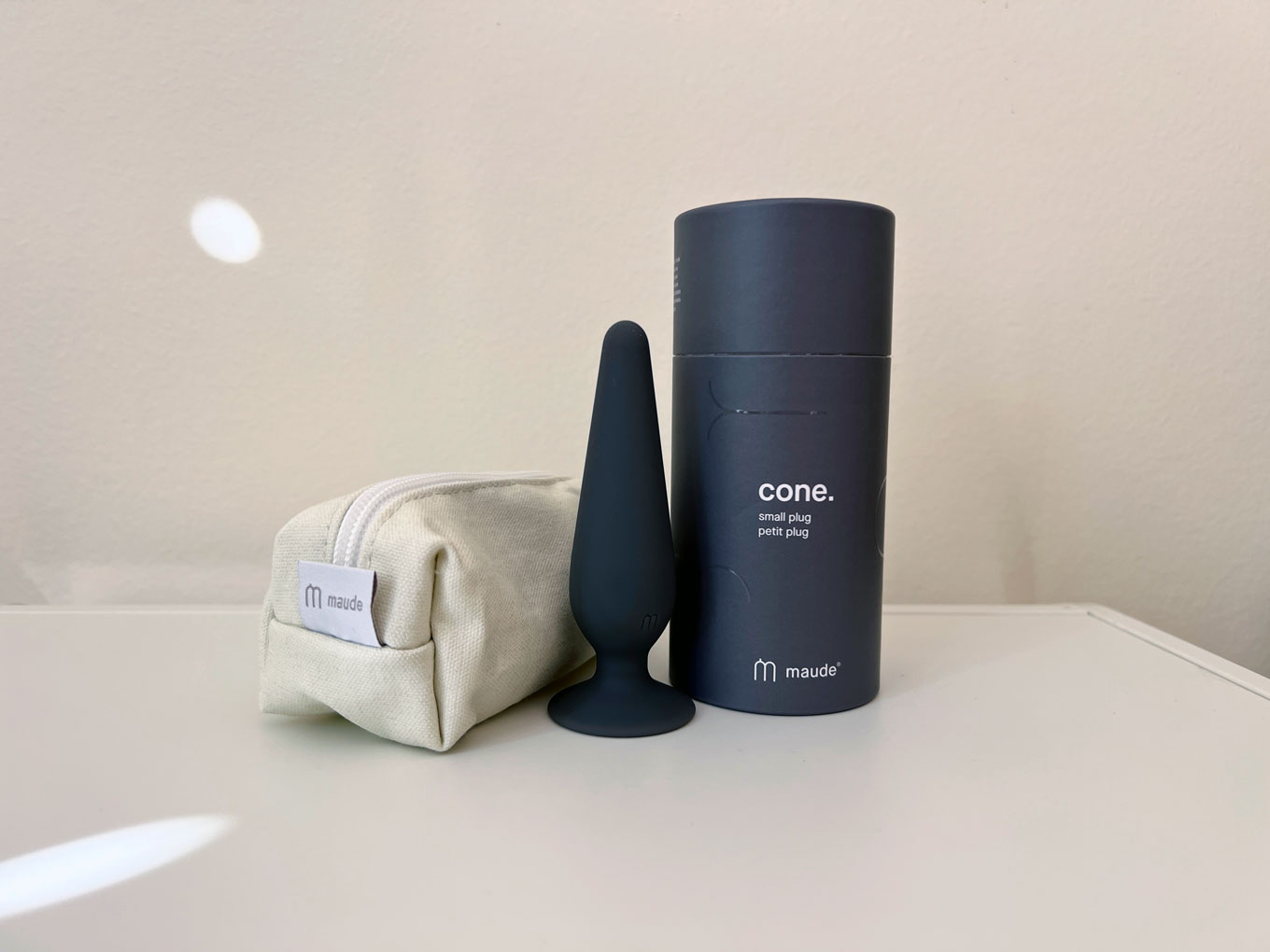 Maude's Cone sits next to its packaging and carrying case